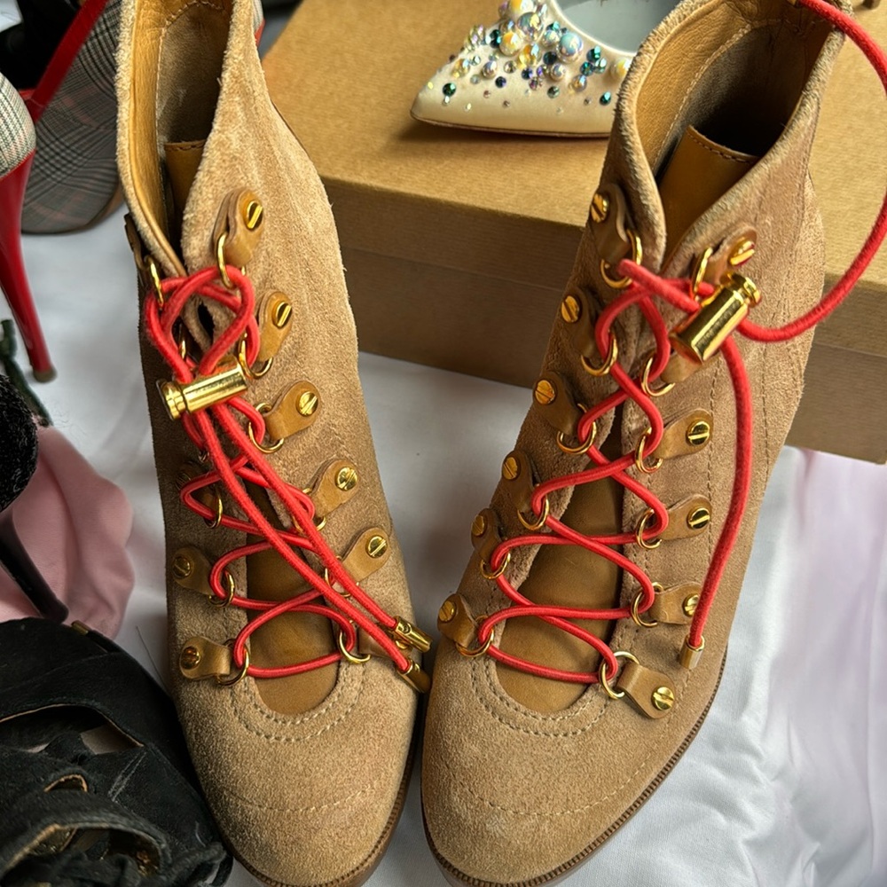 Tory Burch High Heel Combat boot.